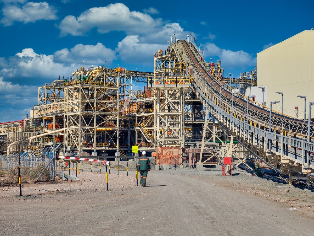 Modern mineral processing facility at golden hour
